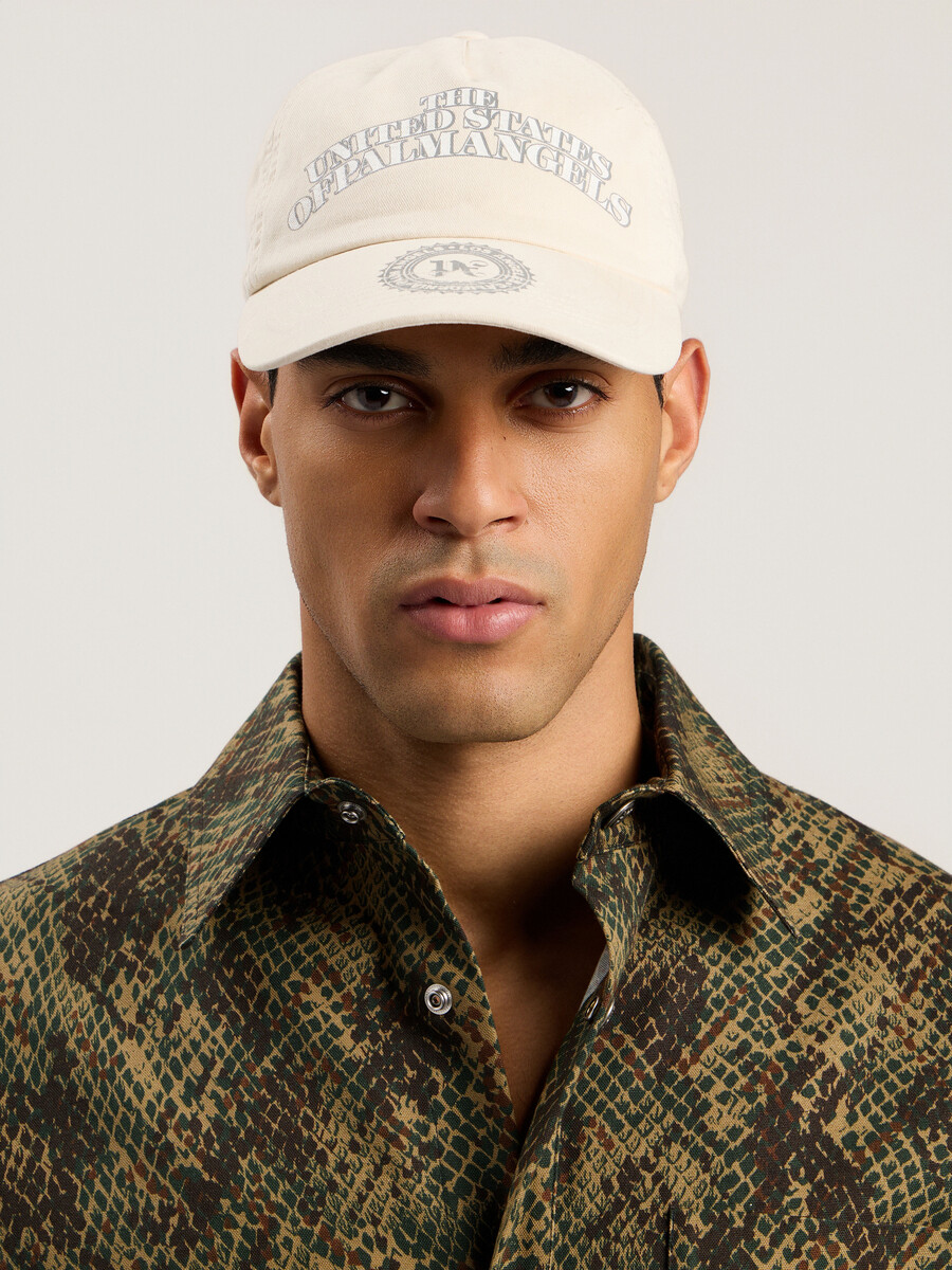 casquette brodée en forme de dollar