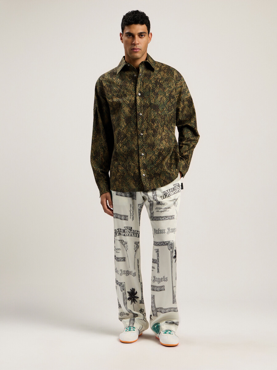 pantalon large à imprimé dollar