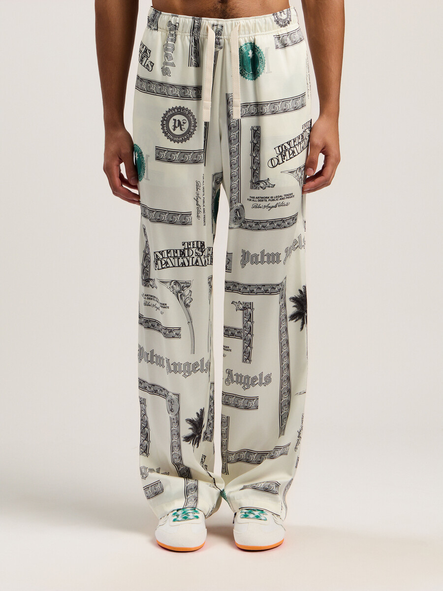 pantalon large à imprimé dollar