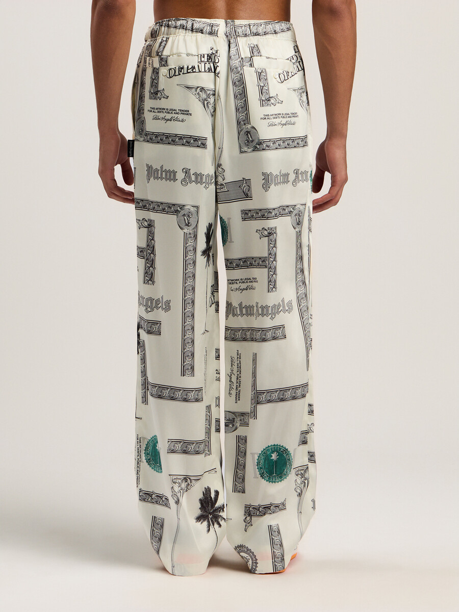 pantalon large à imprimé dollar