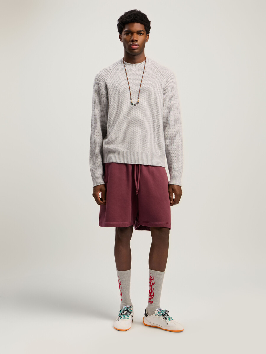 pull côtelé à logo incurvé