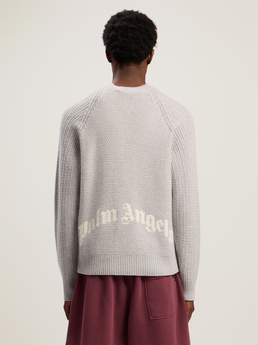 pull côtelé à logo incurvé