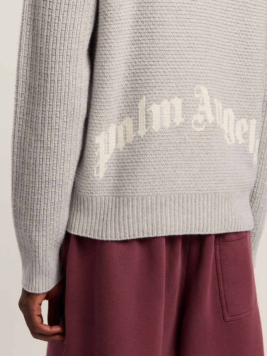 pull côtelé à logo incurvé