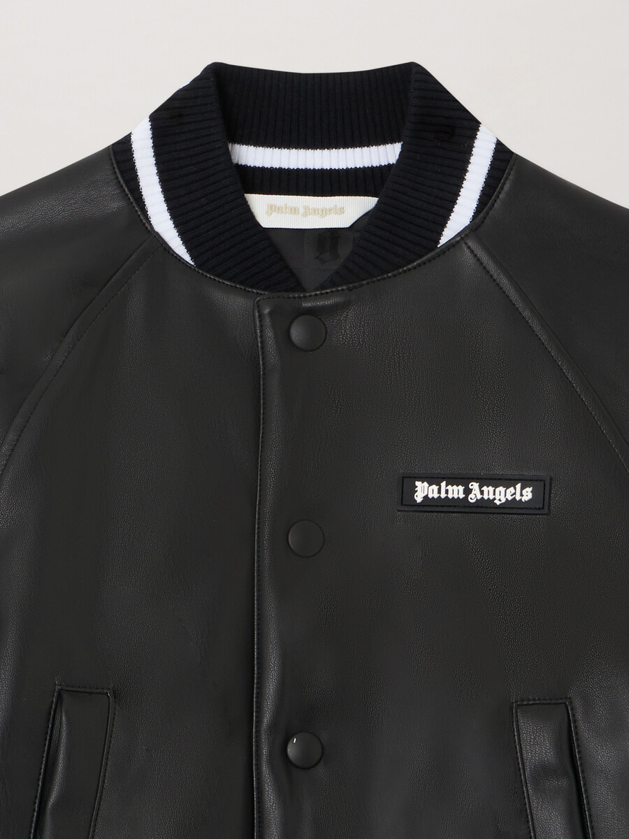veste universitaire enduite